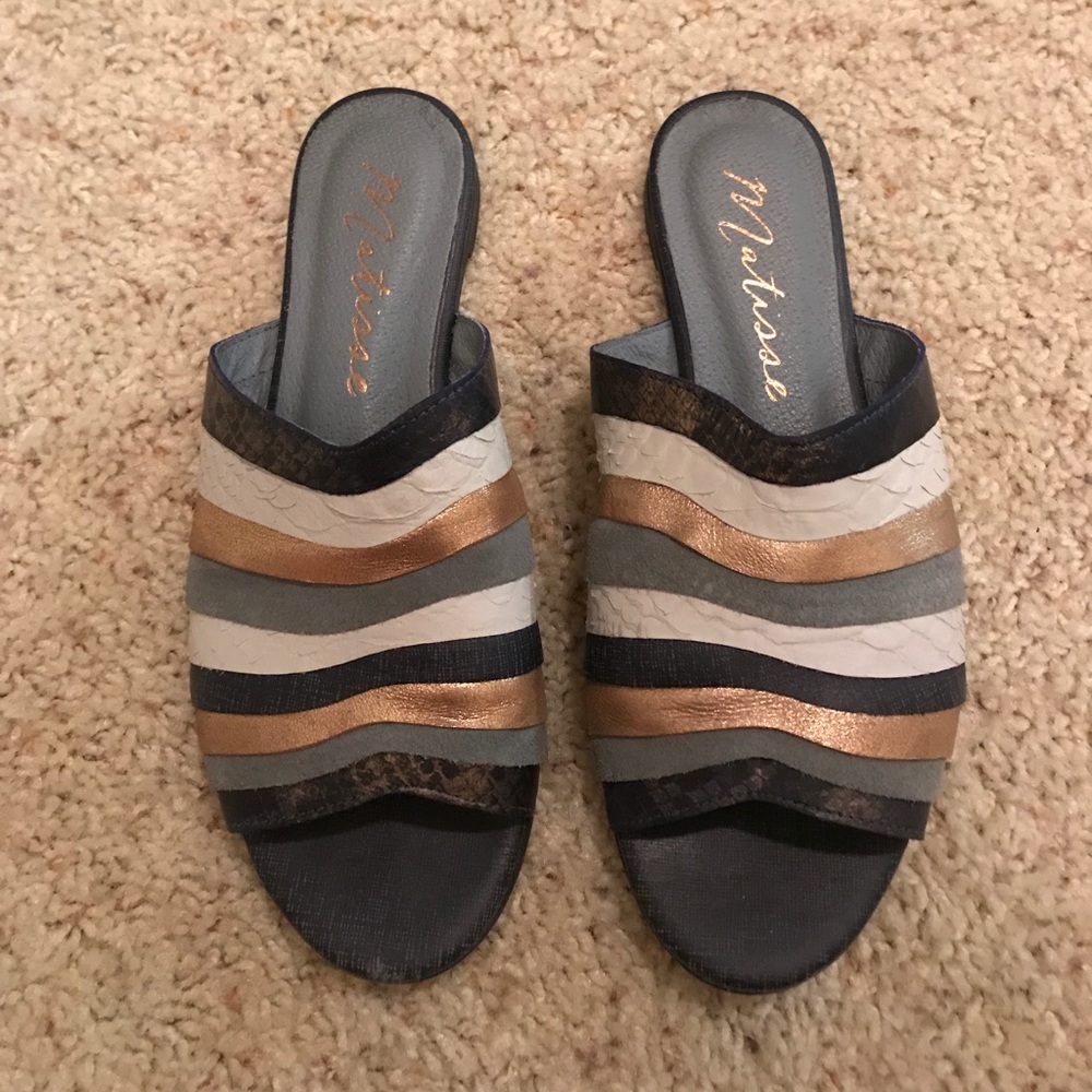 Blue leather slides